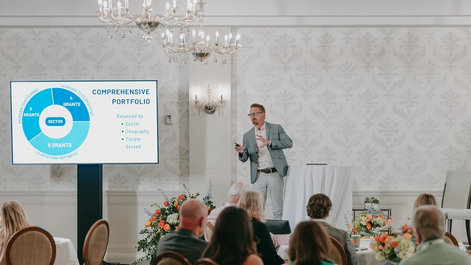 Presenter speaking to guests at the Kingdom Giving Fund Annual Summit
