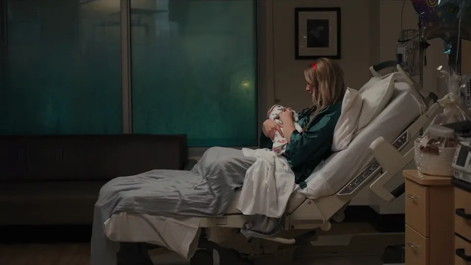 Mother resting in a hospital bed, from the film Your Arrival